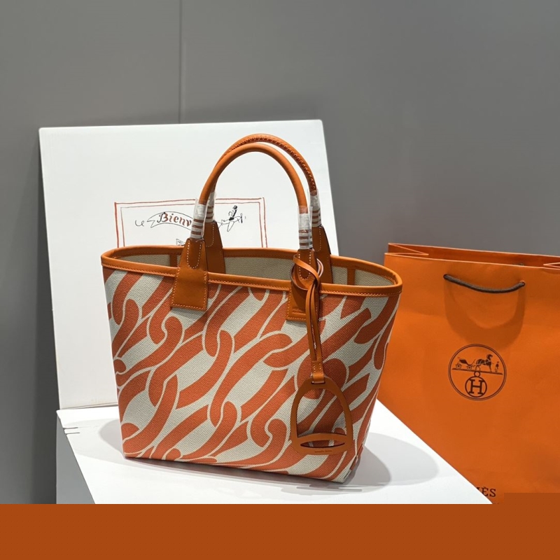 H**mes shopping bags